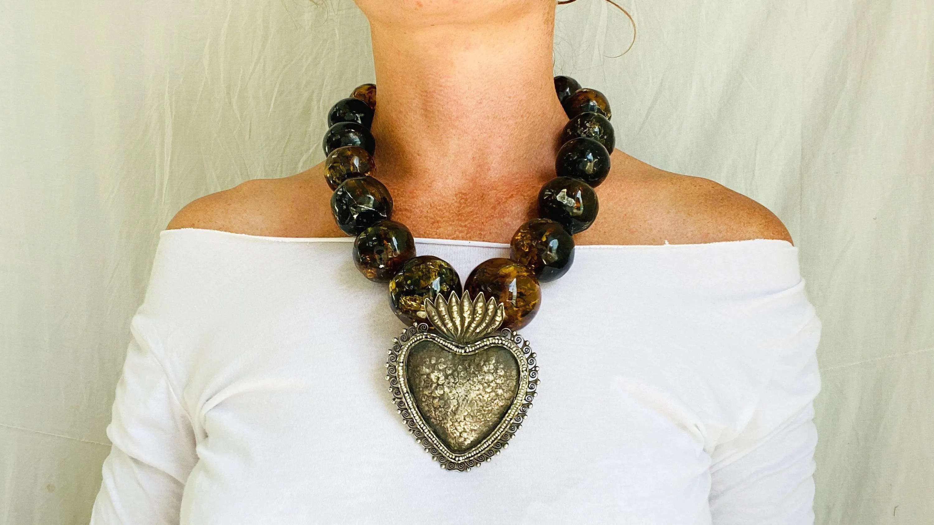 Amber Beaded Necklace, Milagro Sacred Heart Pendant. Sterling Silver.