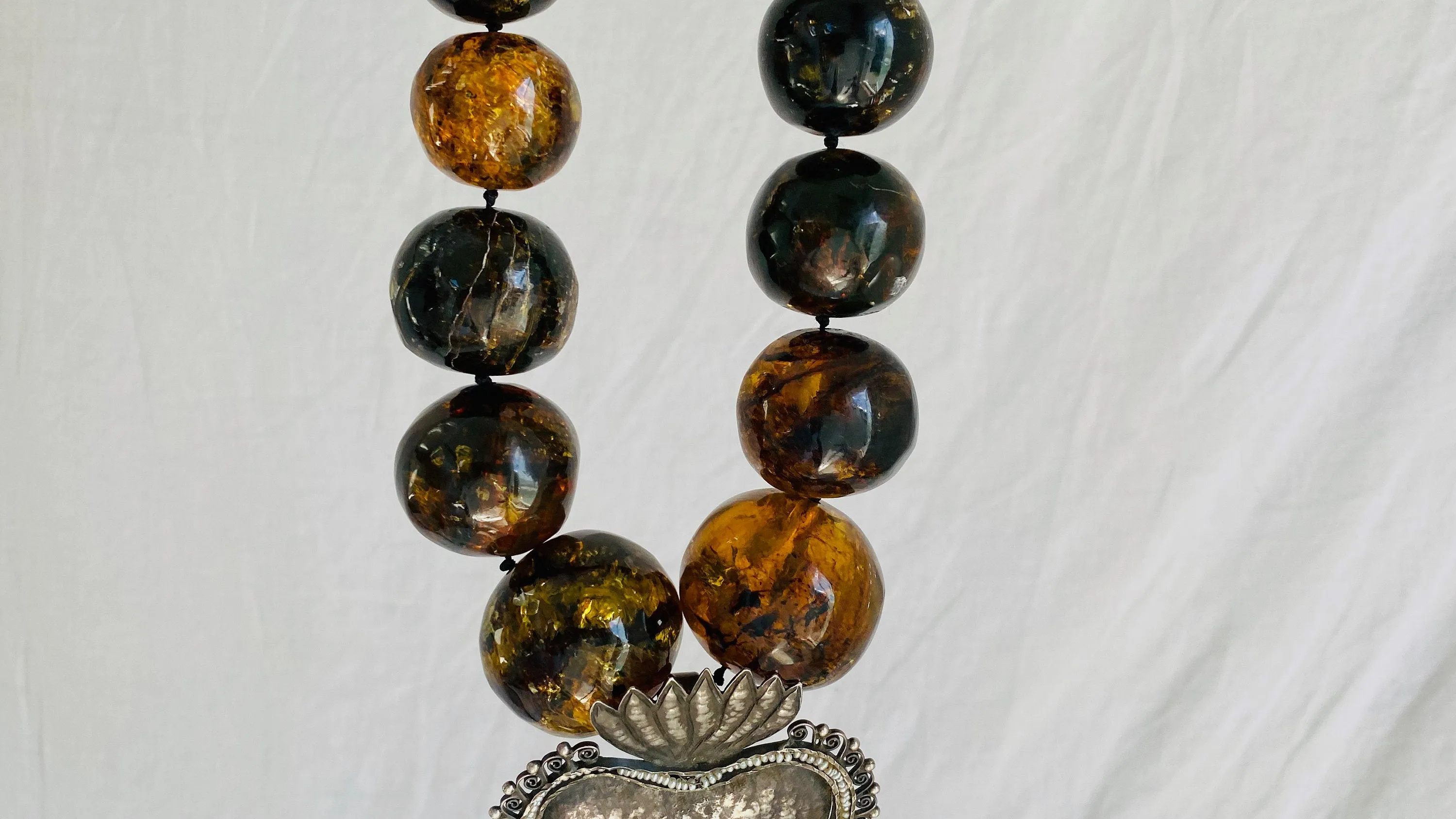 Amber Beaded Necklace, Milagro Sacred Heart Pendant. Sterling Silver.