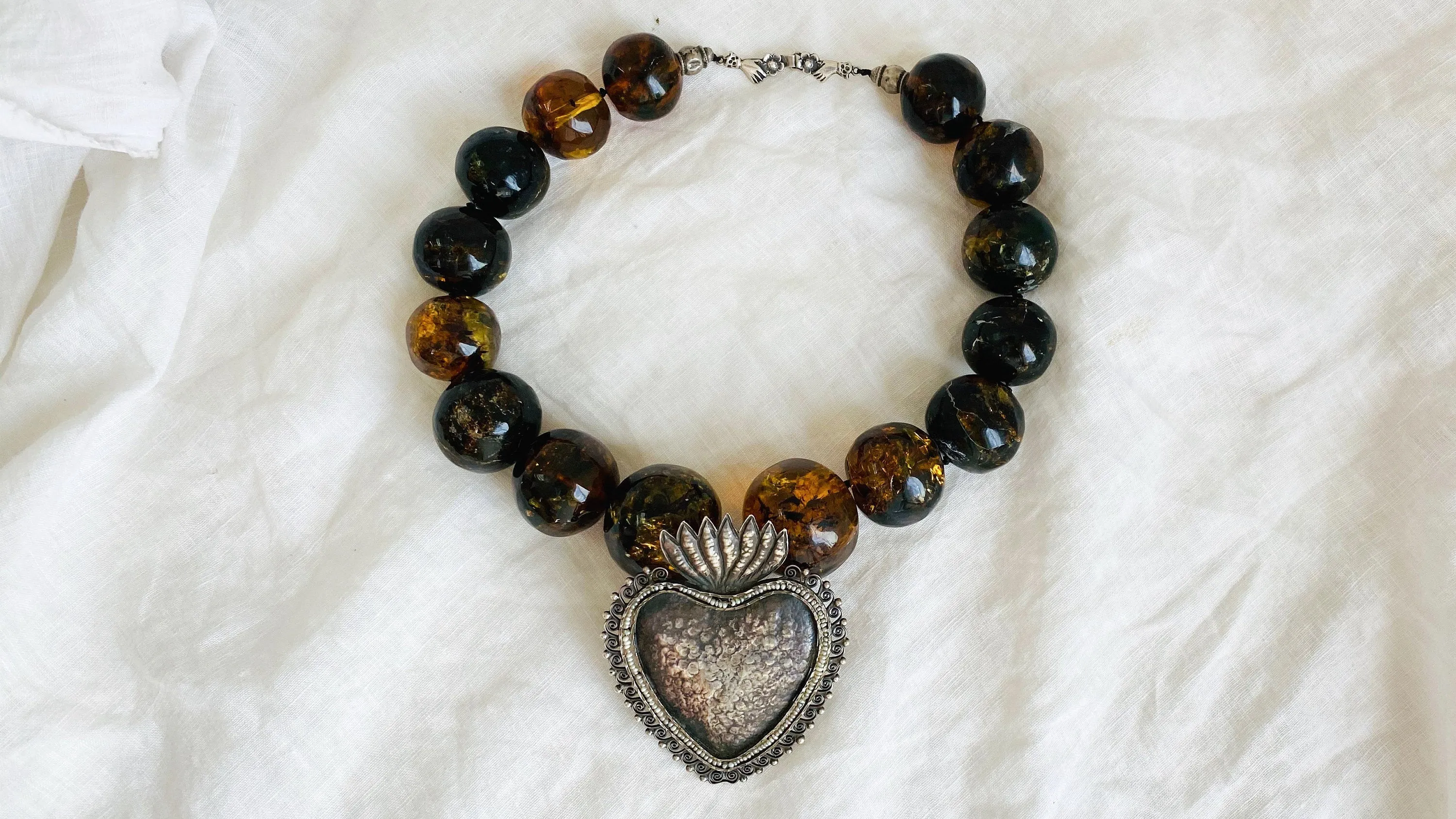 Amber Beaded Necklace, Milagro Sacred Heart Pendant. Sterling Silver.