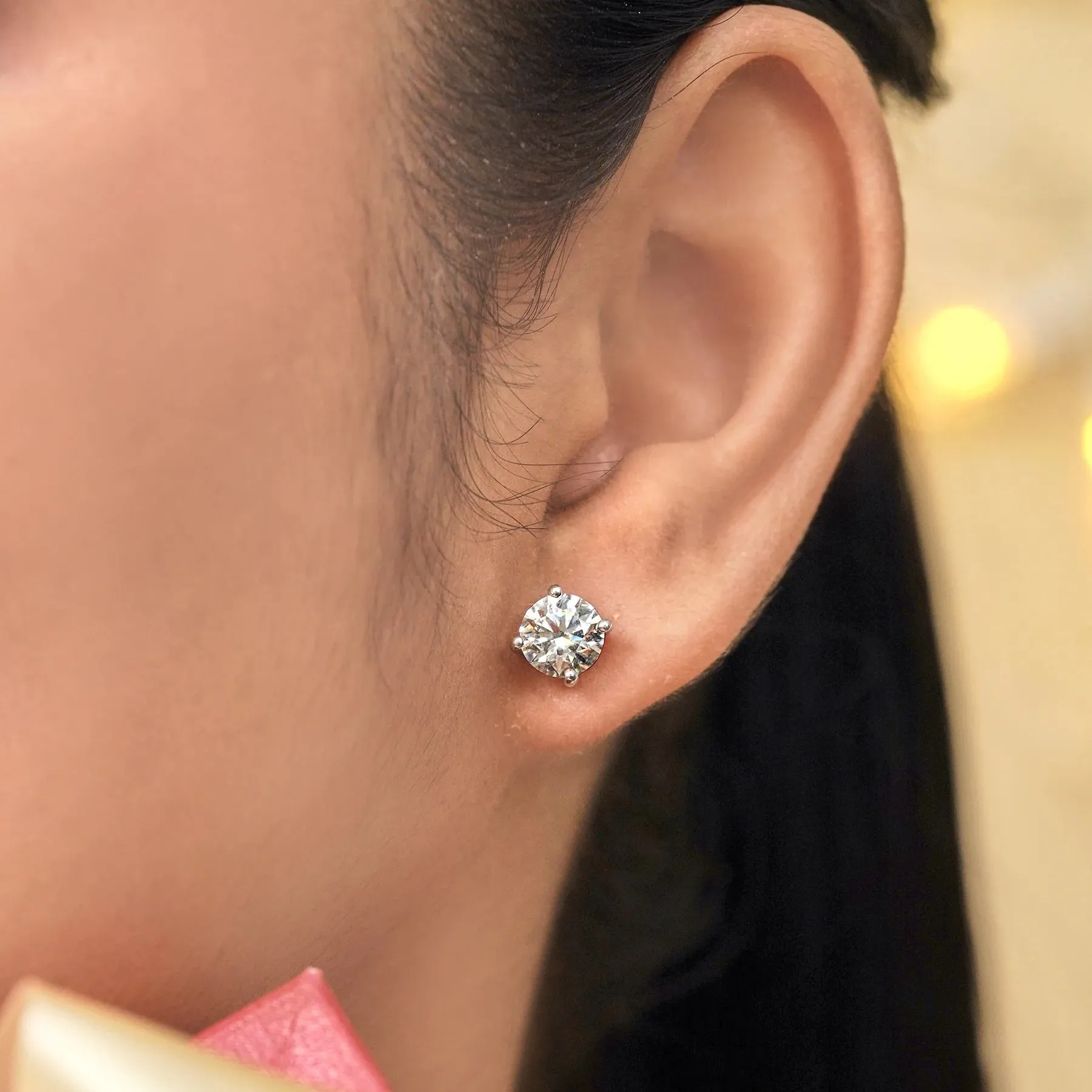 JeenMata 4 Prong 2 Carat Round Shaped Moissanite Solitaire Stud Earrings In 18K White Gold Plating Over Silver